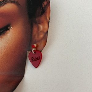 Valentines day heart earrings with red gemstone.
